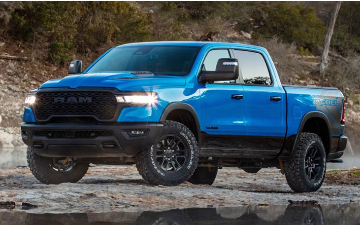 Blue Ram Truck next to river
