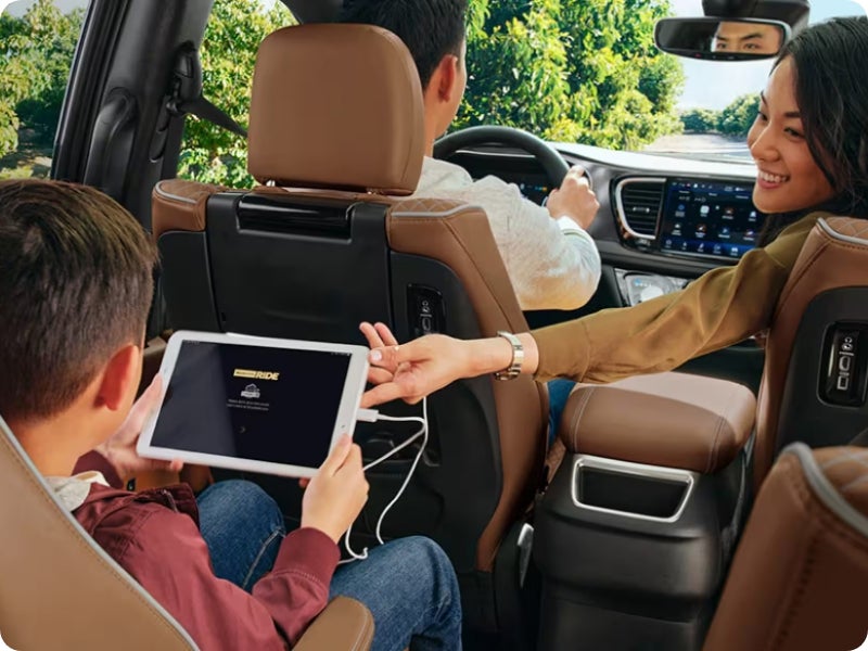 Family within a Chrysler Pacifica