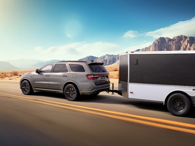 Dodge SUV pulling a trailer
